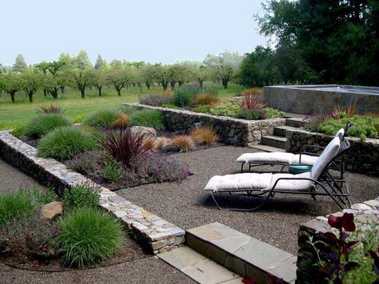 lawn chairs on gravel landscape