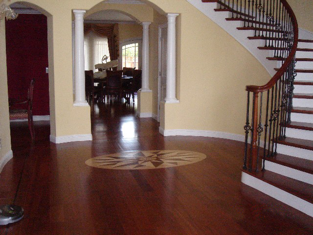 dark hardwood floor with design in center