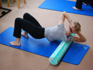 stretching at pilates studio