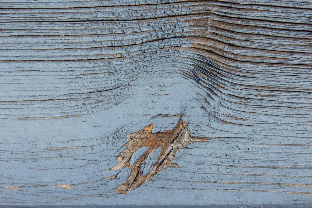 worn paint on wood