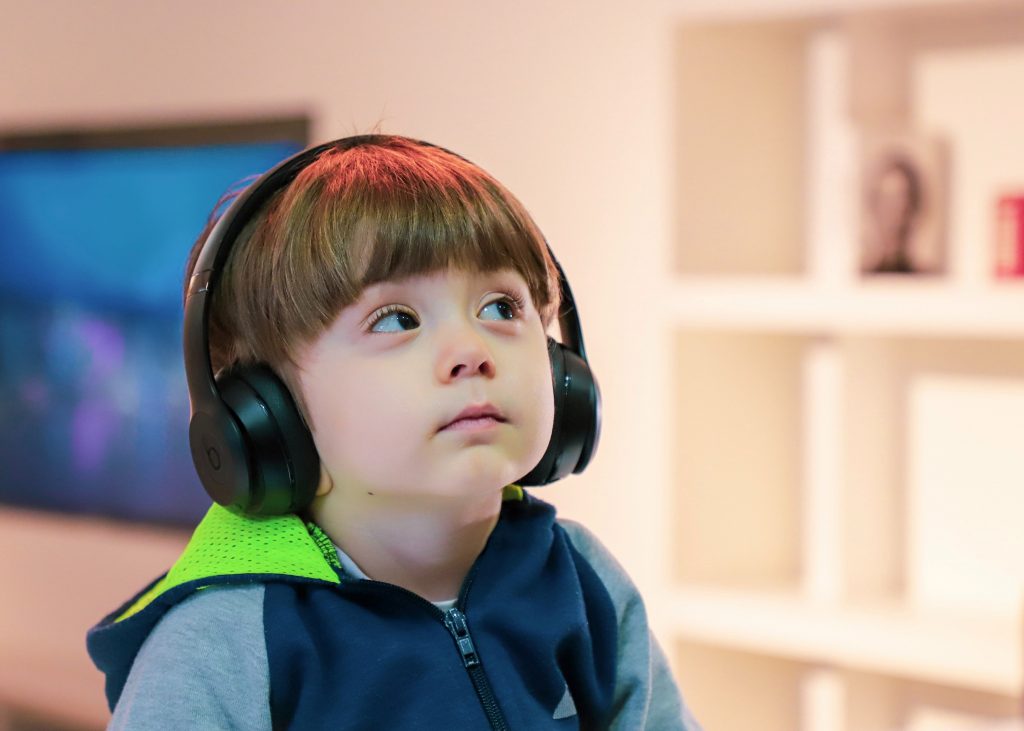 kid with headphones