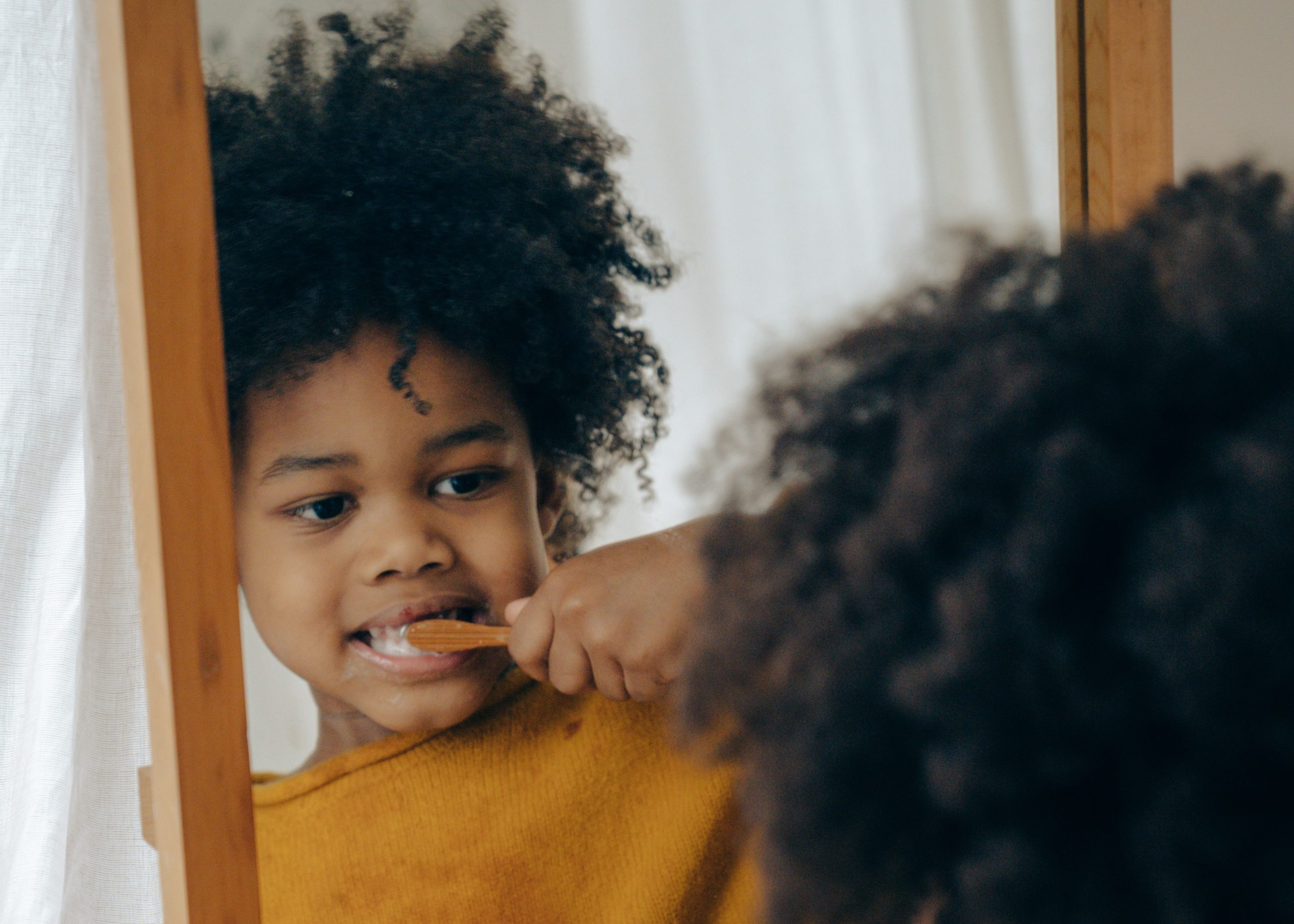 kid brushing teeth