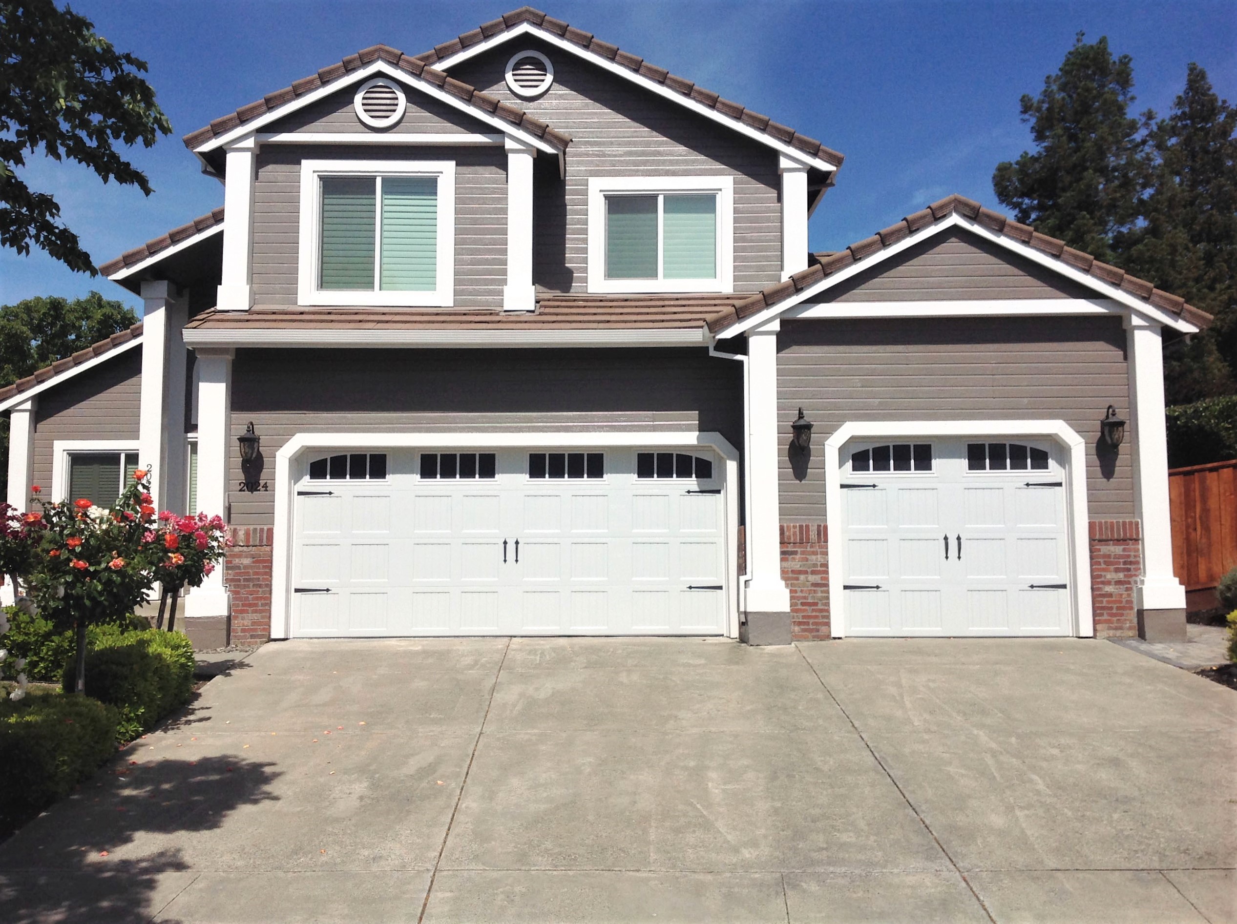 dual white garage doors