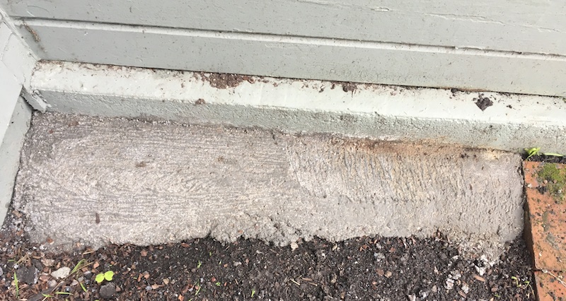 Concrete fills rat holes