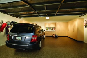 Proactive organizational improvements can transform your garage from a chaotic catch-all to a fully functional space. Photo: PremierGarage (2014)