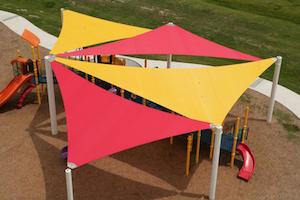 shade sails over a playground